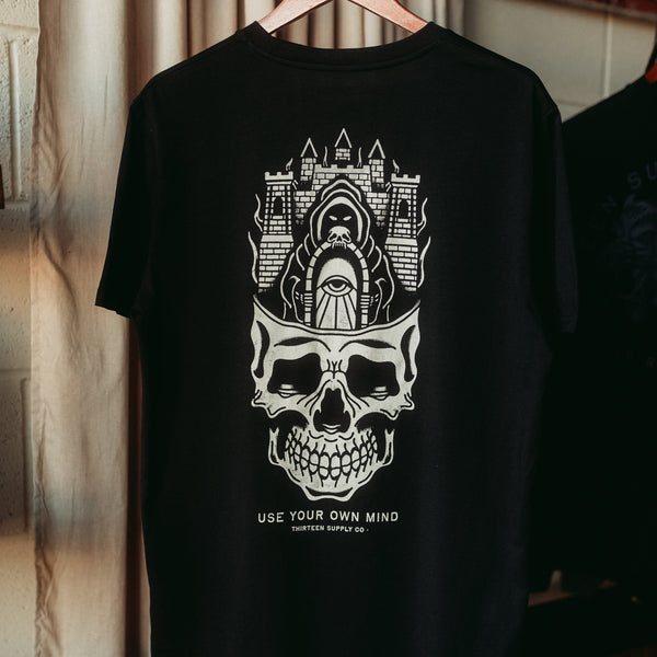ANYWHERE'S BETTER THAN YOUR OWN MIND - BLACK UNISEX T-SHIRT