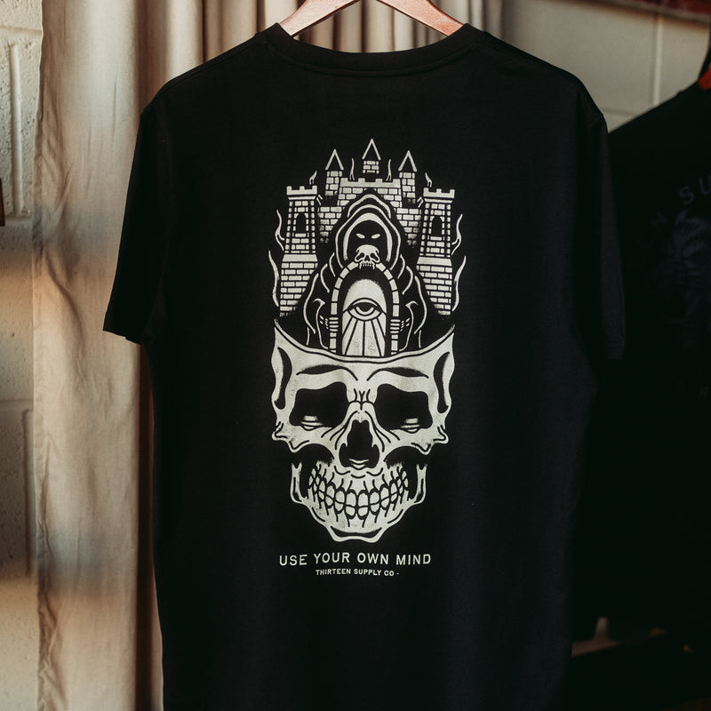 ANYWHERE'S BETTER THAN YOUR OWN MIND - BLACK UNISEX T-SHIRT