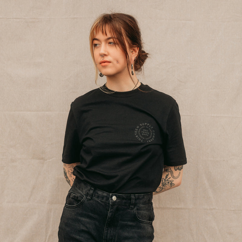 BITE THE HAND - BLACK UNISEX T-SHIRT