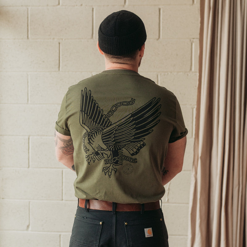 Traditional eagle tattoo design on a khaki unisex t shirt