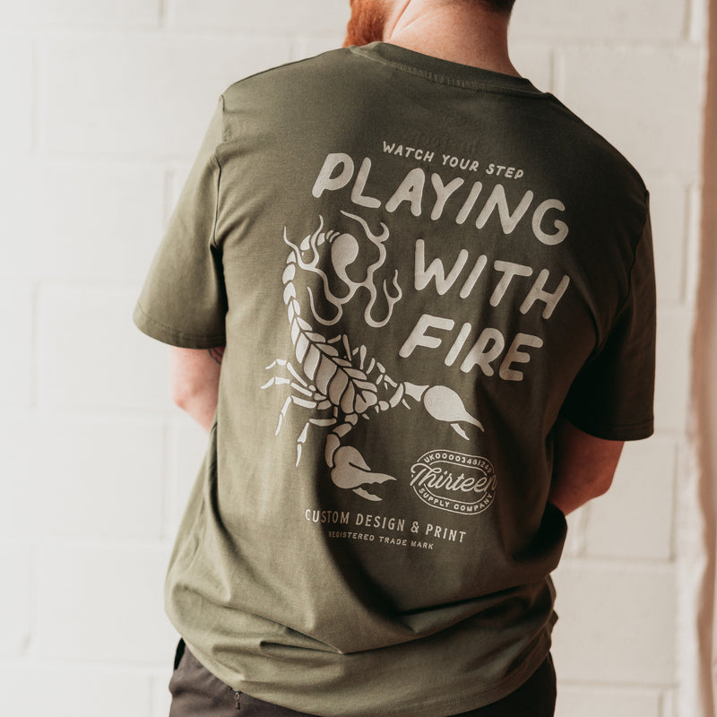 PLAYING WITH FIRE - KHAKI UNISEX T-SHIRT
